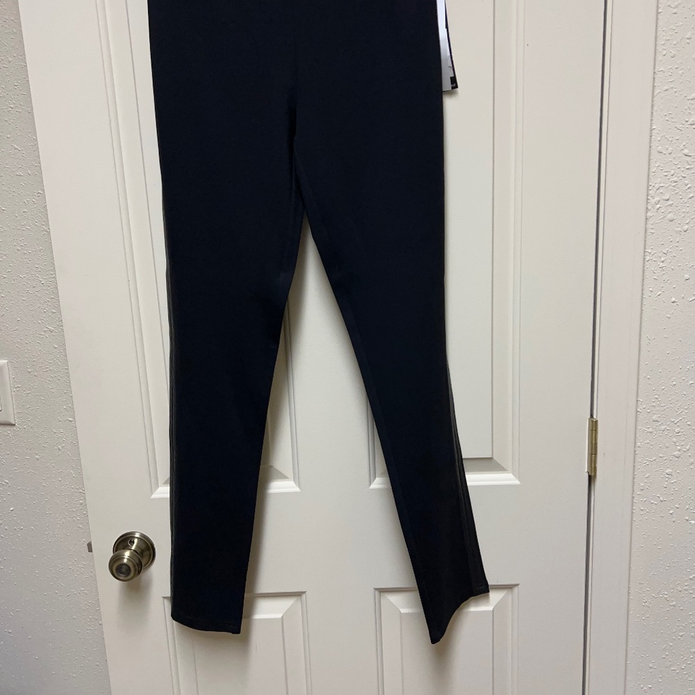 Pants with leather strip down outside of leg
